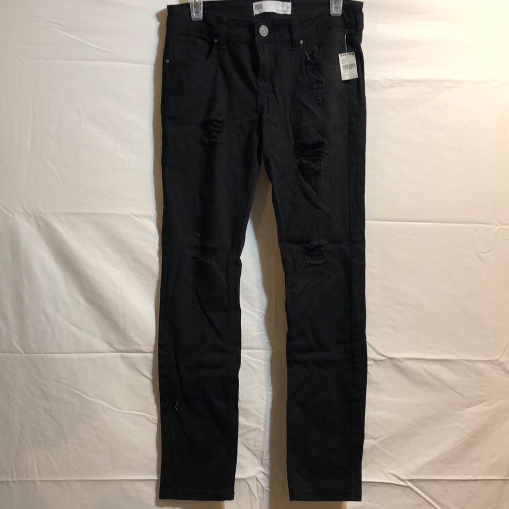 Black straight leg distressed jeans.